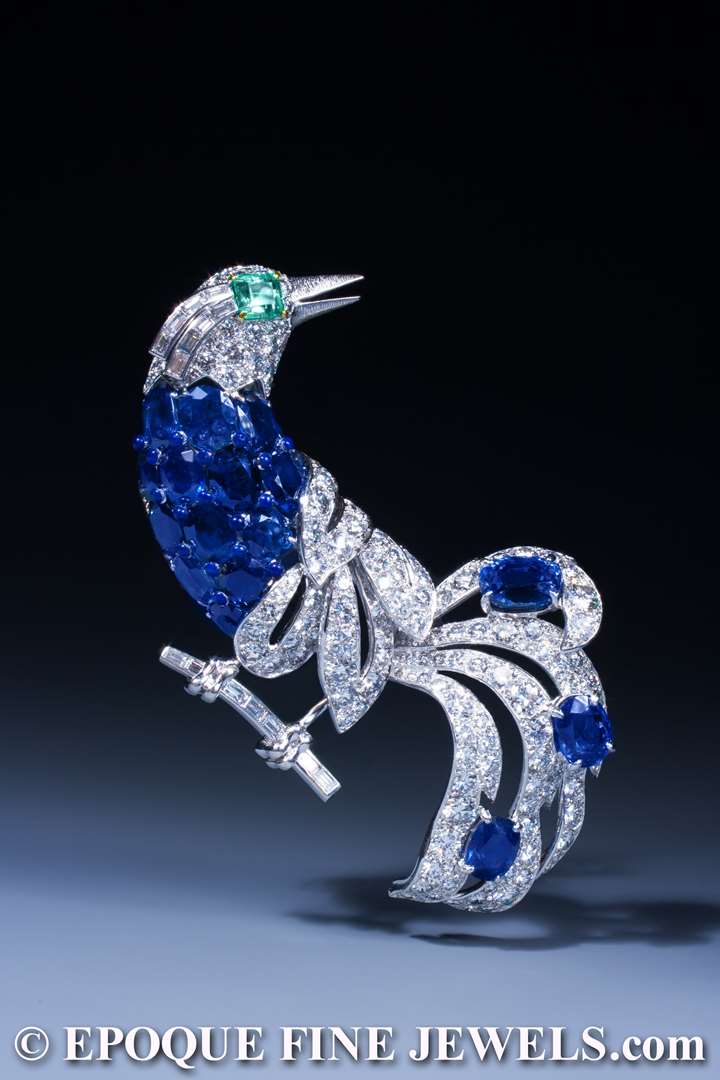 An impressive sapphire, emerald and diamond bird brooch